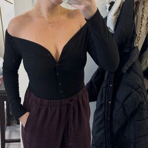 Off the shoulder black bodysuit with buttons size medium. Worn once